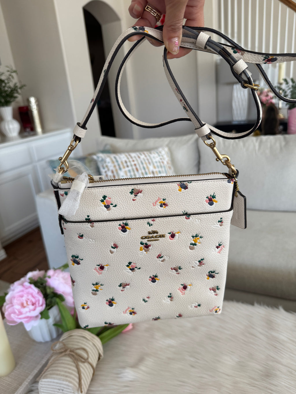 COACH Kitt Messenger Crossbody Bag
With Paint Dab Floral Print