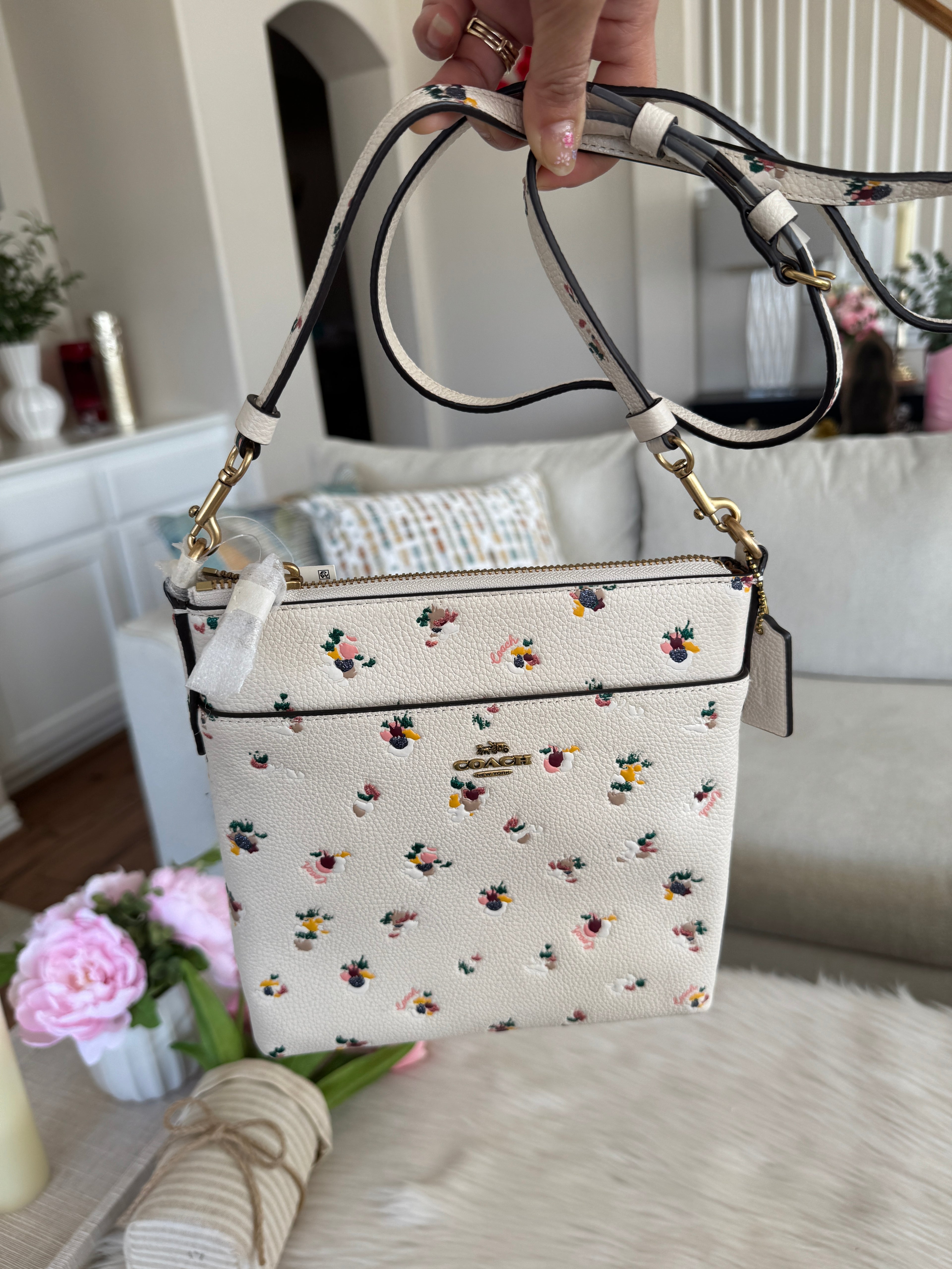 COACH Kitt Messenger Crossbody Bag
With Paint Dab Floral Print