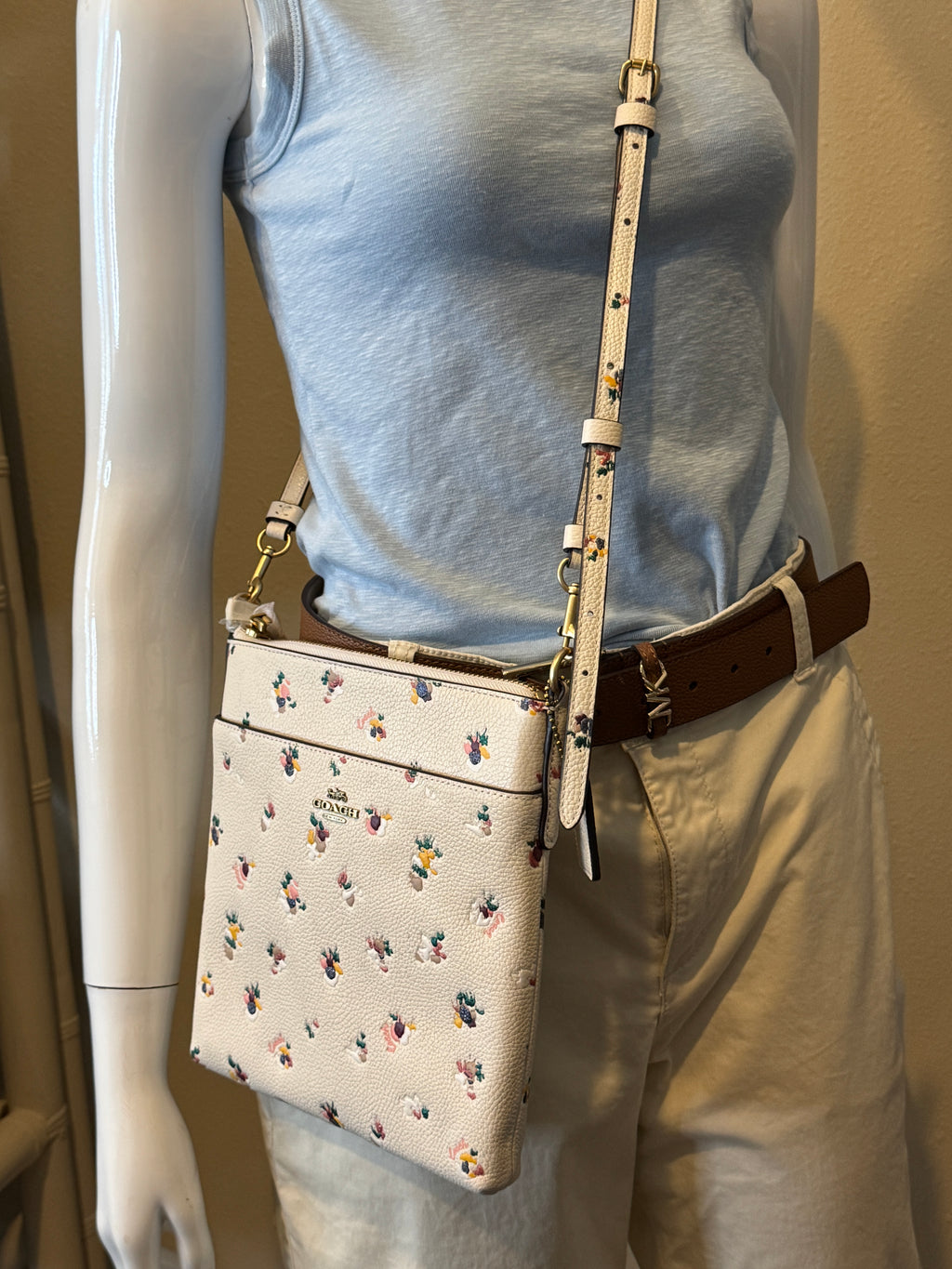 COACH Kitt Messenger Crossbody Bag
With Paint Dab Floral Print